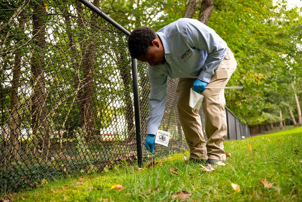 ArrowPestControl employee working on field