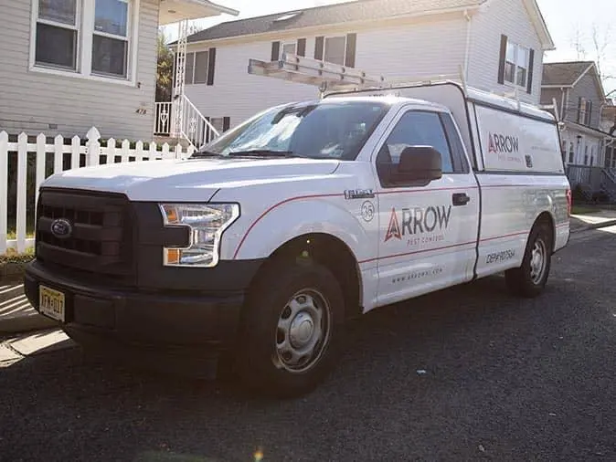 pest-control-vehicle-in-nj-neighborhood